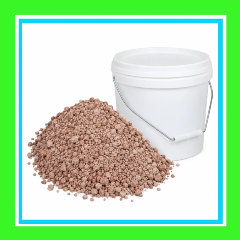 Bentonite clay granules beside a white bucket