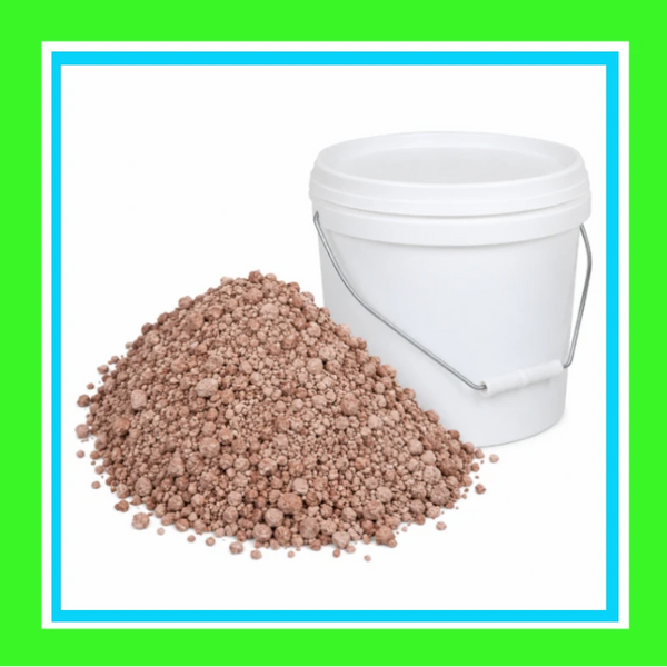 Bentonite clay granules beside a white bucket